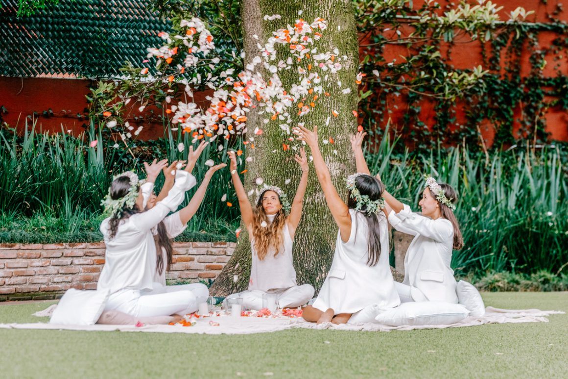 Volunteer facilitators preparing session resources